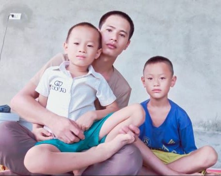 husband and sons cropped